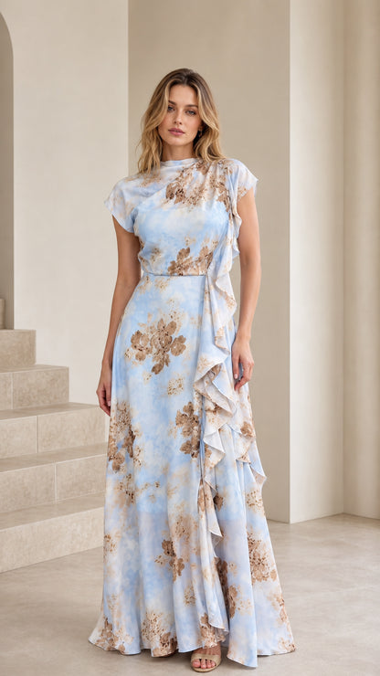 Model wearing the powder blue floral ruffle maxi dress from the front