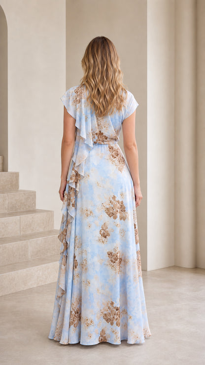 Back view of the powder blue floral maxi dress with flowing maxi skirt